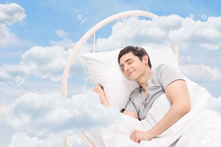 SEN - 37354207-joyful-man-sleeping-on-a-bed-in-the-clouds.jpg